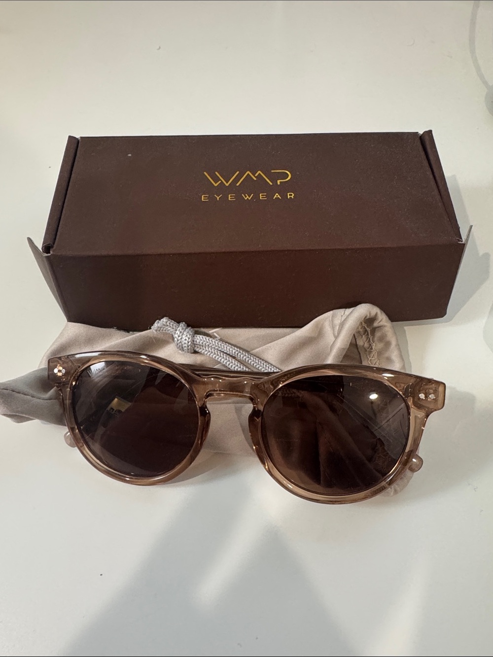 WMP Eyewear Women’s Transparent Brown Round Sunglasses